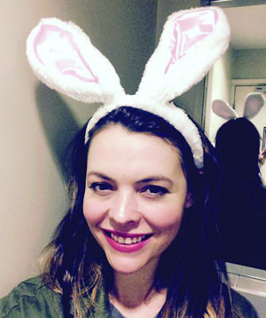 Actor Kate Ford wearing rabbit ears