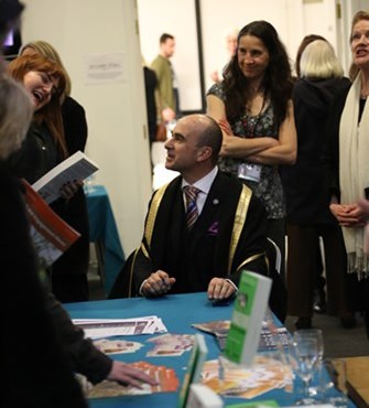 philip signing books.jpg