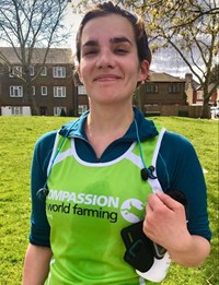 Anna in a Compassion running vest