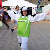 Angela Andrews in a cow onesie